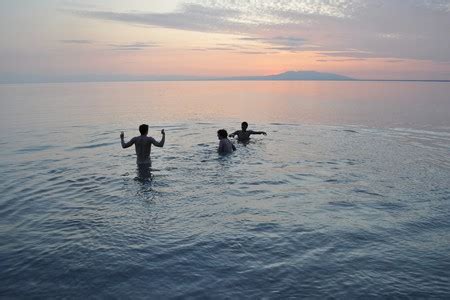 This idiomatic expression was first coined in 1947. . Boys skinny dipping in greece